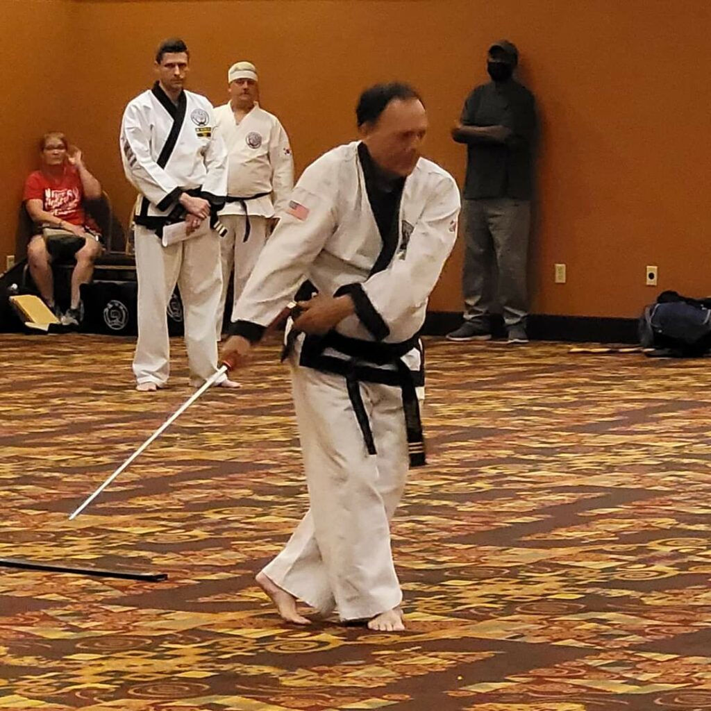 Mr. Oster performing sword form.