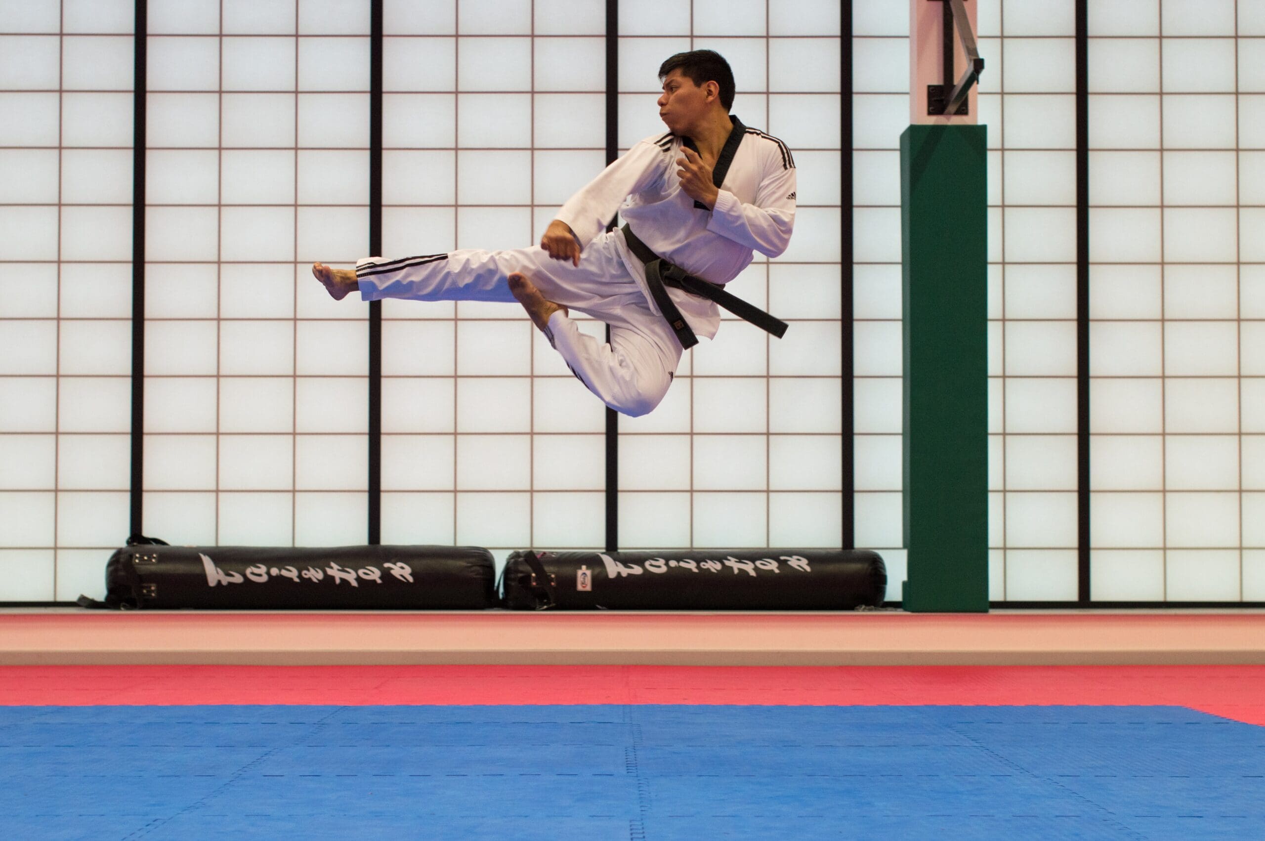 Martial arts karate practice enhances both your body and mind by improving physical fitness, cardiovascular health, and muscle tone through dynamic movements and full-body workouts while teaching self-defense techniques, self-discipline, and mental focus, leading to personal growth, increased self-esteem, and stress relief.