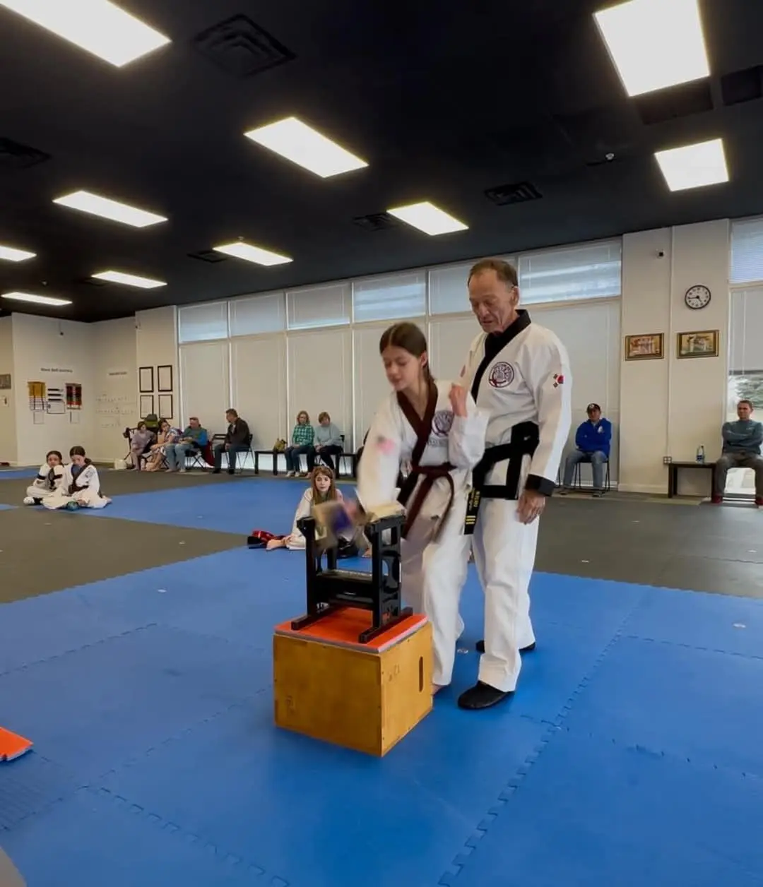 young students learning benefits of martial arts techniques
