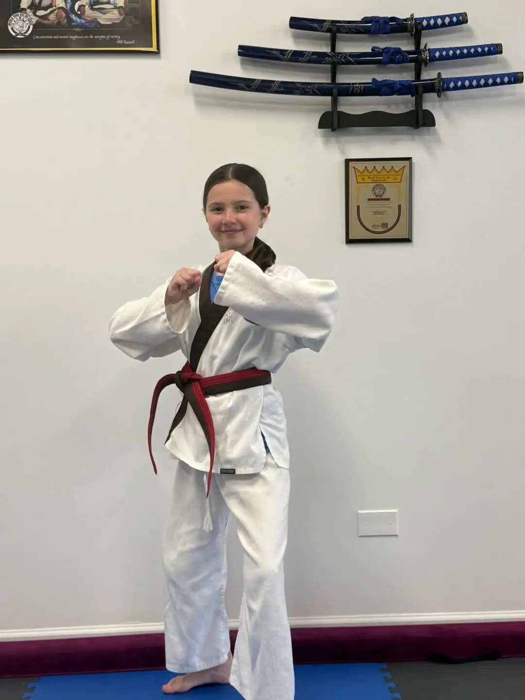 a child enjoying martial arts benefits in group class